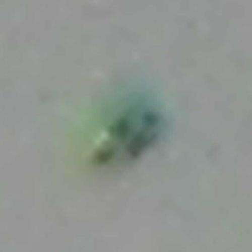 This is the best picture of Craft-4 from the original "McDiner UFO Event" of Jan. 1, 2017. This craft appeared to be damaged. The damage is evident as splotches on the right side, & may have been caused by a lightning strike.  [(c)2017MarianRudnyk. All Rights Reserved.]