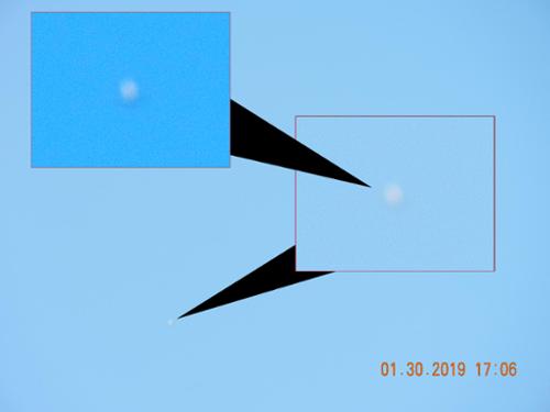 On Jan. 30, 2019 I spotted this orb hovering next to power lines across the street. After several moments it shot off into the canyons of the BigM mountain. I suspect it was somehow recharging from those lines.

(c)2019MarianRudnyk