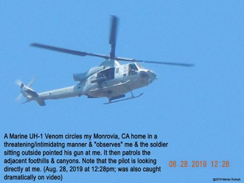 On Aug. 28, 2019, an unnumbered US Marine UH-1 Venom Helicopter circles directly over me so low that the soldiers & airmen on board angrily stare me down. This is one of many of such battlefield helicopters that appear here over my Monrovia, CA home. [(c)2019MarianRudnyk. All Rights Reserved.] 