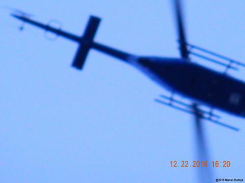 This Pasadena PD helicopter further breaks the law as it doubles down & makes an even lower pass at me. This is actually just one of many-many such helo-harassments I have endured. Make sure to check out the dramatic video of this event posted among my videos here. [(c)2019MarianRudnyk.]